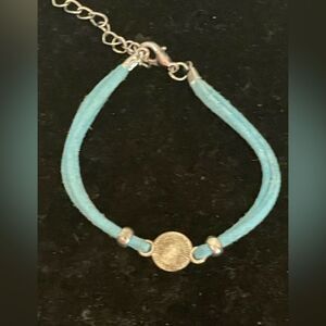 KBD Studios 6” leather bracelet with 2” extender & gold tone sunburst charm